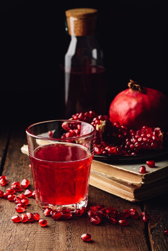 Trifecta -Glass of cocktail with pomegranate juice