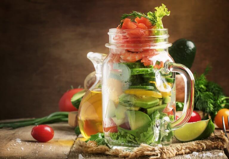 Salad with vegetables, avocado, shrimp and trout, source of omega-3