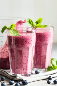 Two Glasses of Blueberry Smoothie.