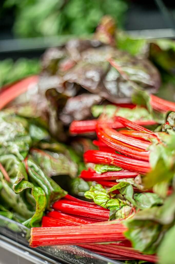 grocery store produce section Swiss chard rhubarb